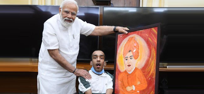 దివ్యాంగుని ప్రతిభను చూసి భావోద్వేగానికి లోనయిన ప్రధాని దివ్యాంగుని ప్రతిభను చూసి భావోద్వేగానికి లోనయిన ప్రధాని