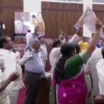 చెప్పులు, బూట్లు ధరించి వెంకన్న ఫొటోతో వైఎస్సార్సీపీ ఆందోళన